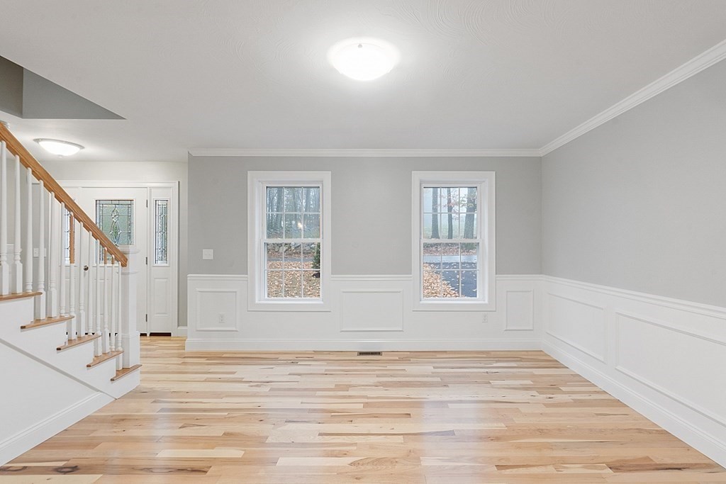 150 French Road, Unit LOT 4 Templeton, MA 01468 - Photo 5 of 28 a view of an empty room with wooden floor and a window