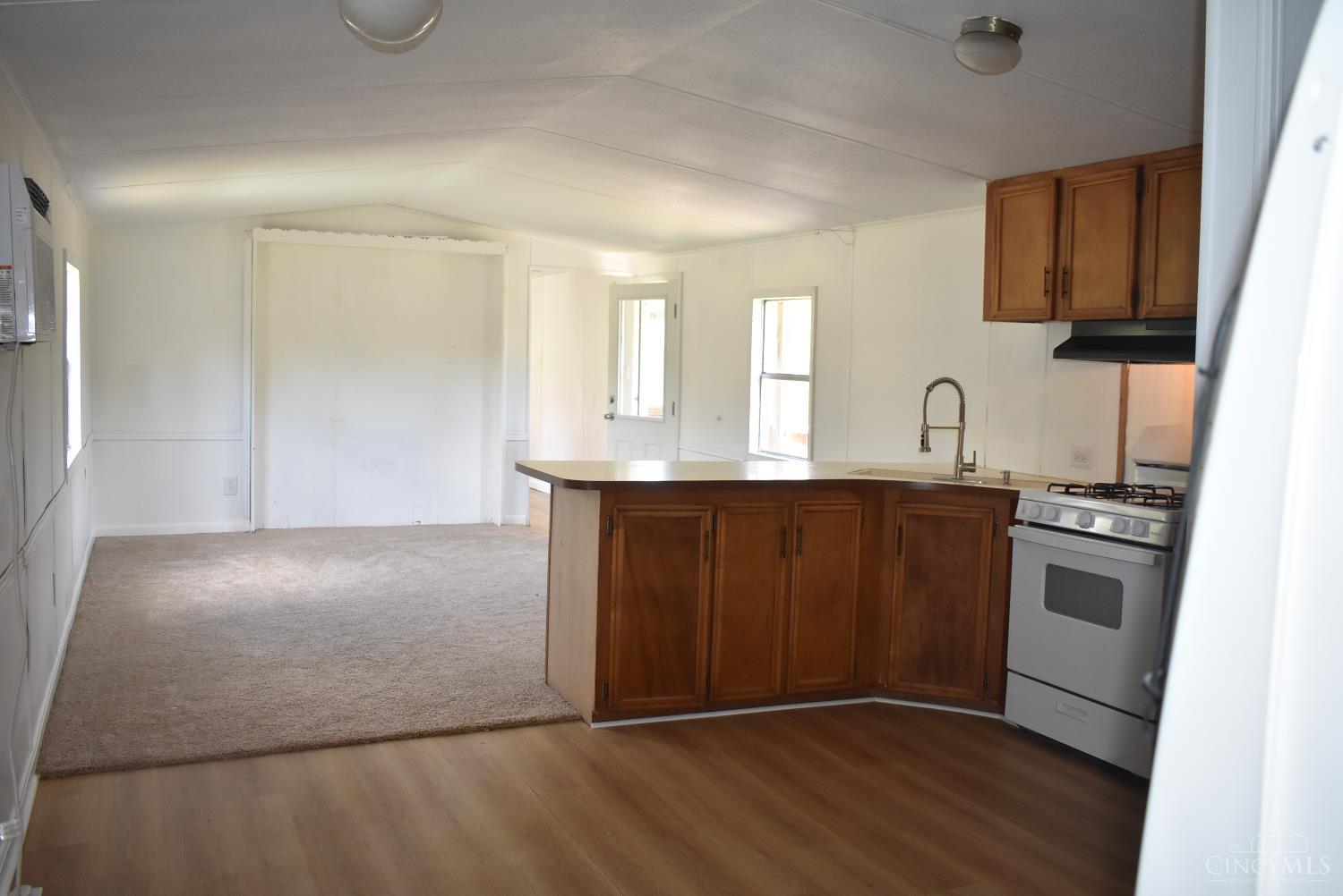 1721 May Hill Road Peebles, OH 45660 - Photo 11 of 27 Wood cabinets in kitchen new flooring throughout