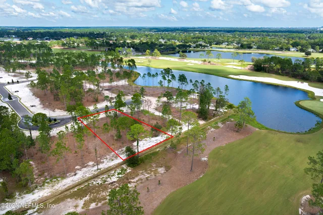 a view of a wooden floor with a tree