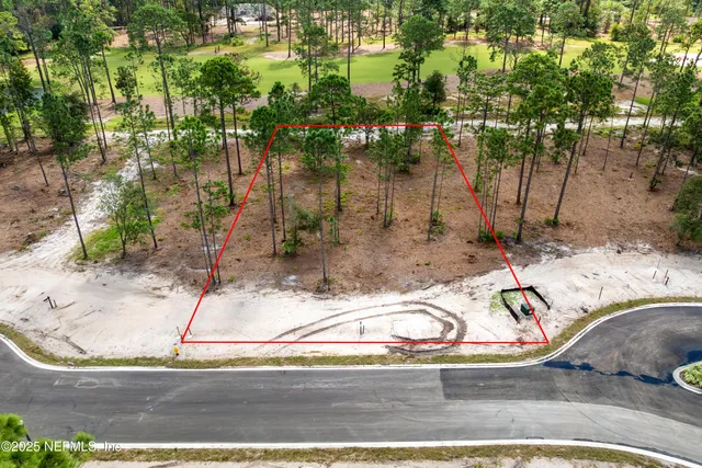 a view of a park with swings and slides