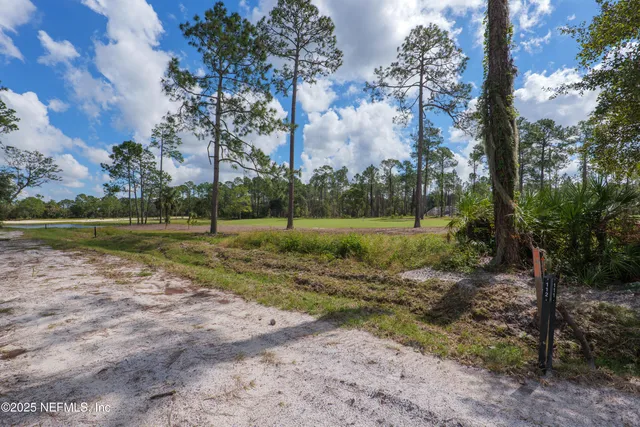 a dining table with chairs and window