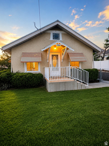 1766 Kenilworth Road Spring Glen, UT 84526 - Photo 1 of 24 Stucco exterior with a peaked roofline and dormer window