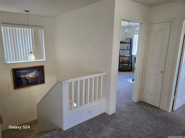 a view of a hallway with workspace