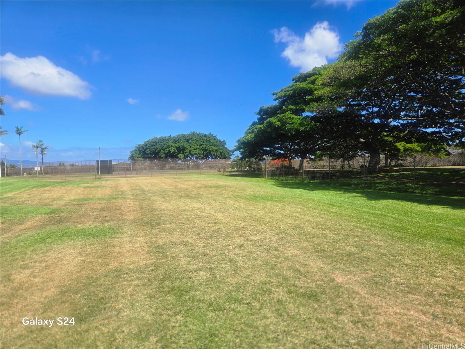 94-1008 Makakoa Loop Waipahu, HI 96797 - Photo 21 of 24 a view of a field with an outdoor space