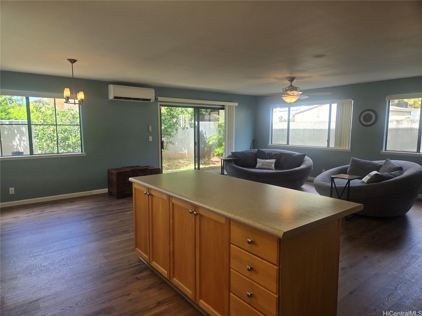 94-1008 Makakoa Loop Waipahu, HI 96797 - Photo 5 of 24 a living room with furniture and a large window