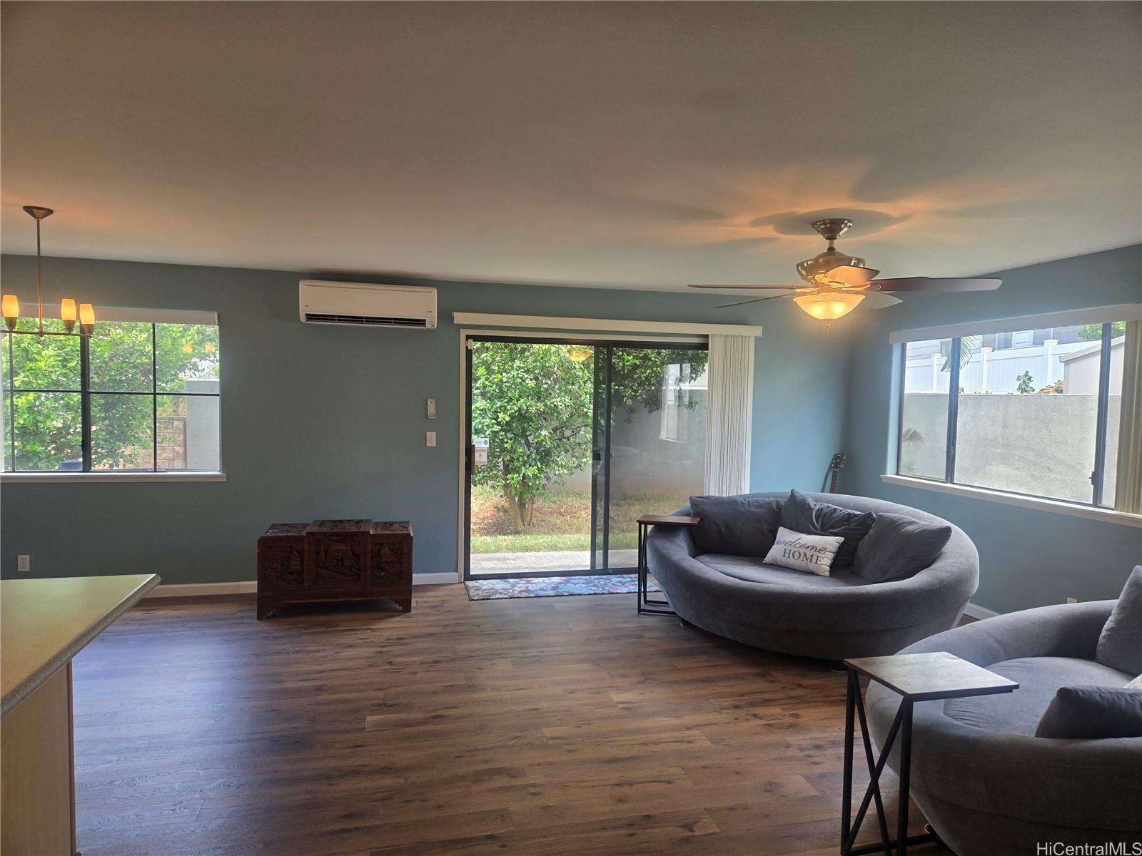 94-1008 Makakoa Loop Waipahu, HI 96797 - Photo 6 of 24 a living room with furniture and a potted plant