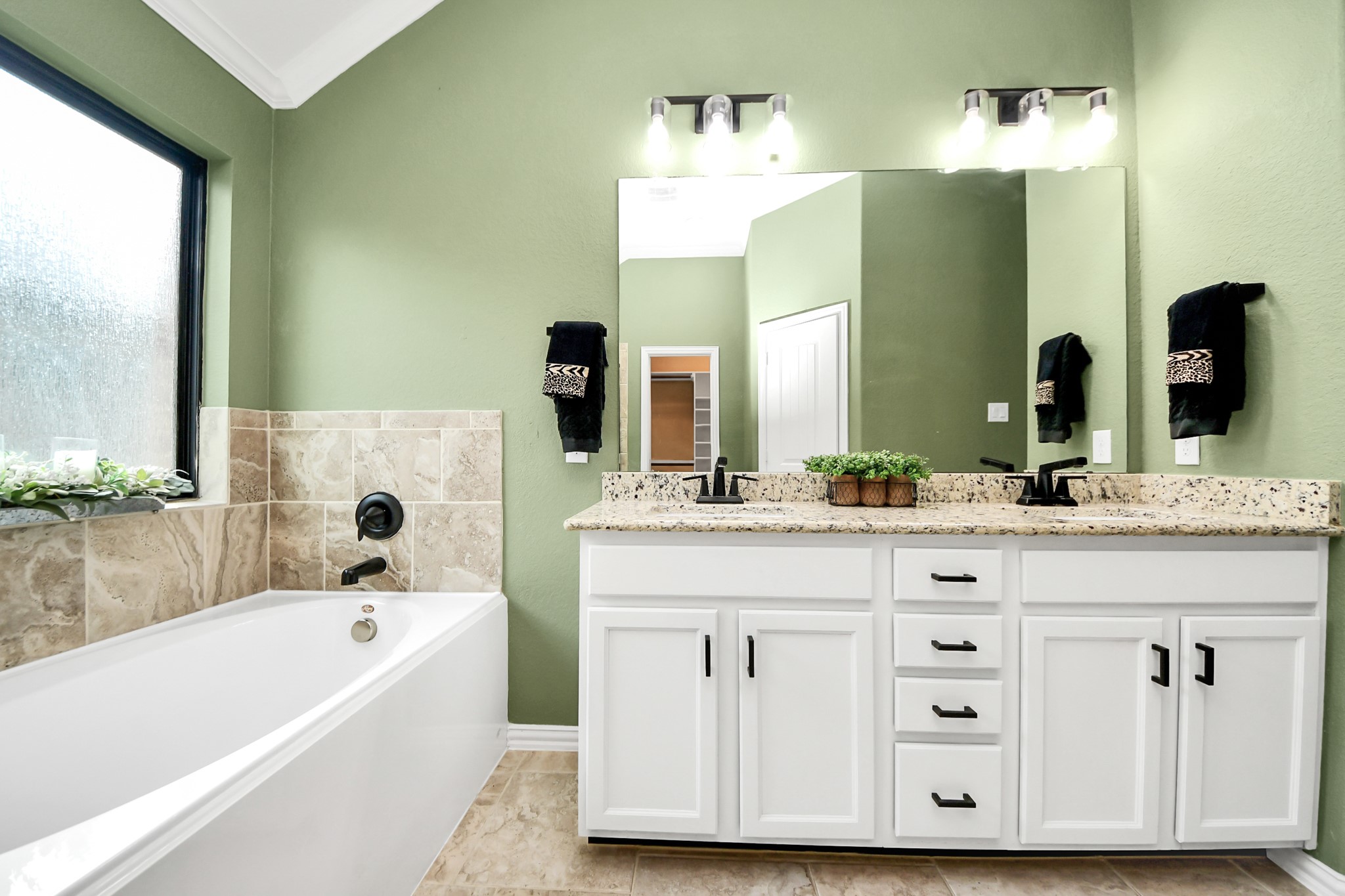 3825 Enchanted Timbers Lane Spring, TX 77386 - Photo 14 of 30 Includes a double vanity, tub and walk-in shower!