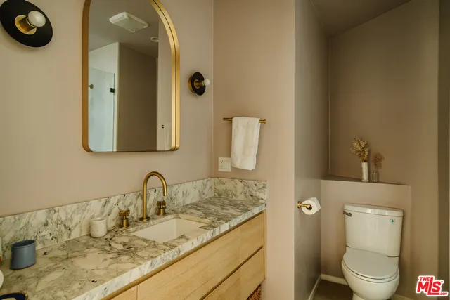 a swimming pool with some tall trees