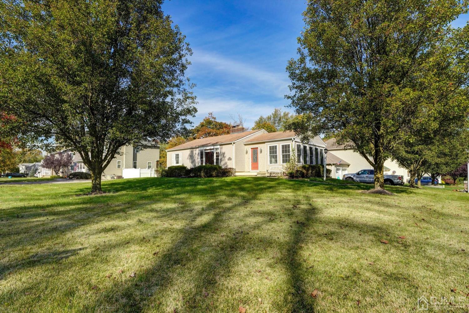 14 Middlesex Road Matawan, NJ 07747 - Photo 2 of 27 a front view of a house with a garden