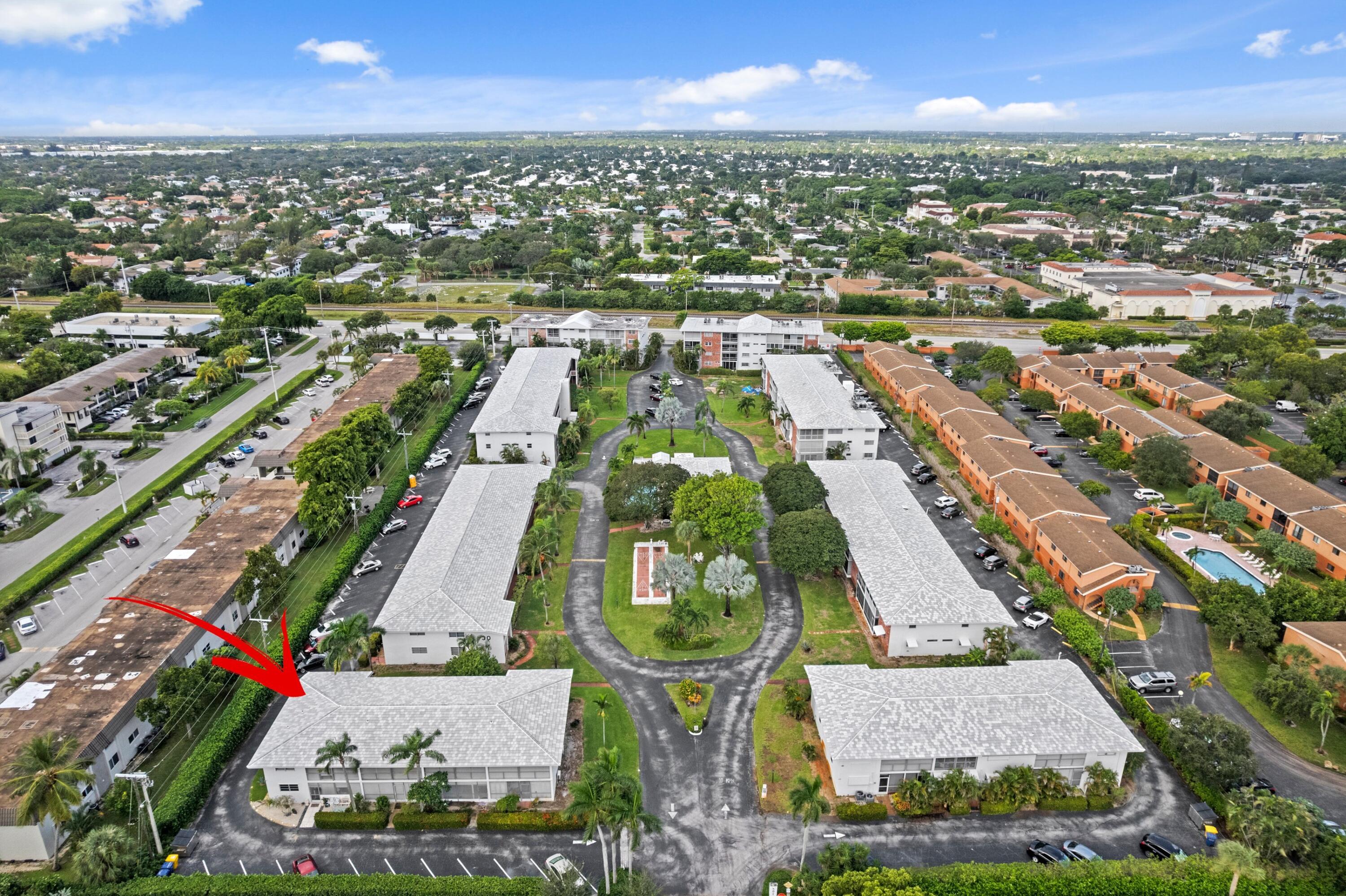 40 Southeast 13th Street, Unit B1 Boca Raton, FL 33432 - Photo 19 of 34 an aerial view of residential houses with outdoor space