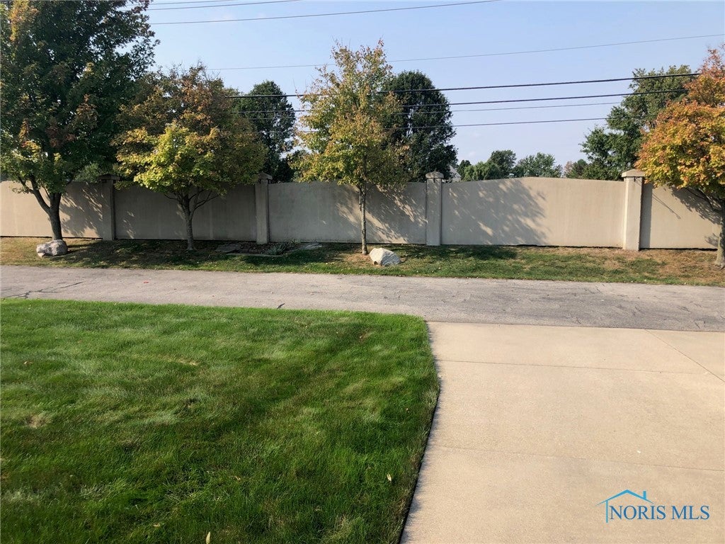 5841 Waterville Monclova Road Waterville, OH 43566 - Photo 5 of 39 This is the view of the wall between Waterville Monclova Road and the property. A nice buffer for the noise and the traffic.