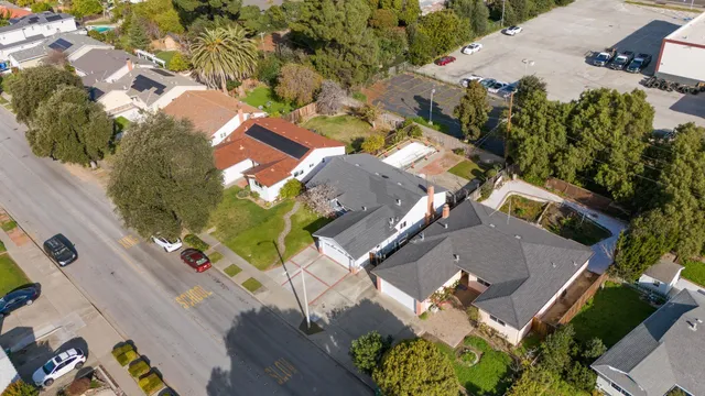 an aerial view of a city with lots of residential buildings