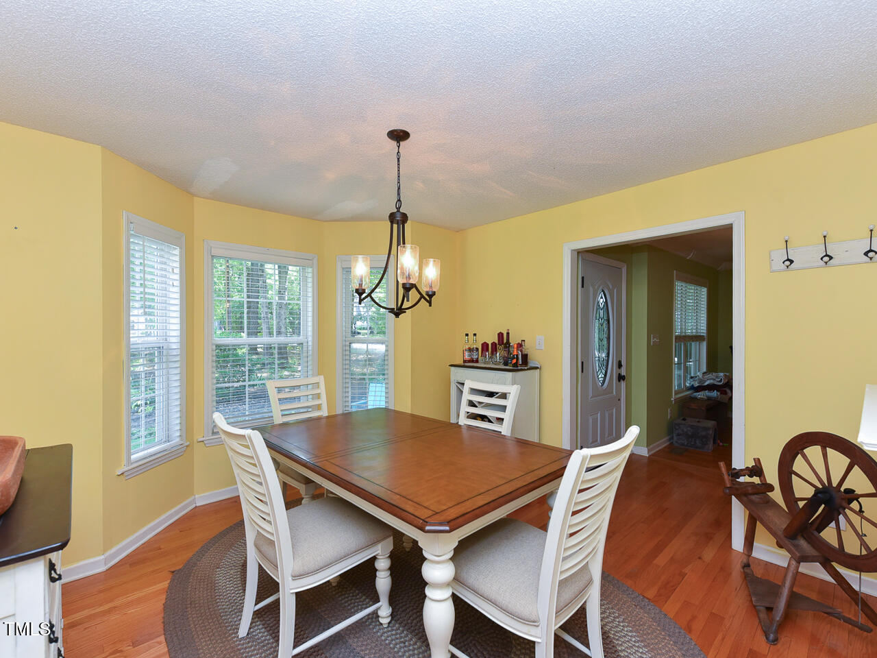 125 Walker Run Selma, NC 27576 - Photo 13 of 47 a view of a dining room with furniture window and wooden floor