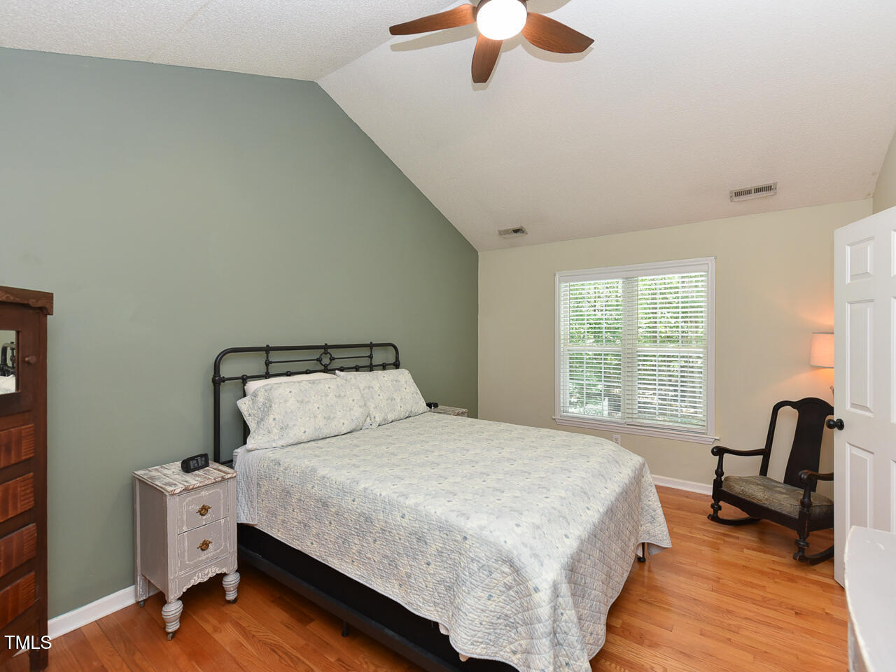 125 Walker Run Selma, NC 27576 - Photo 20 of 47 a bedroom with a bed and a large window