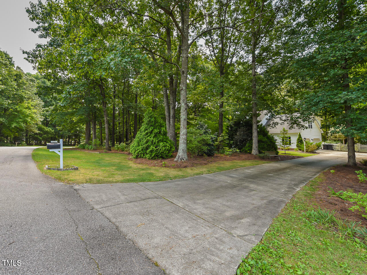 125 Walker Run Selma, NC 27576 - Photo 2 of 47 a view of a park with large trees