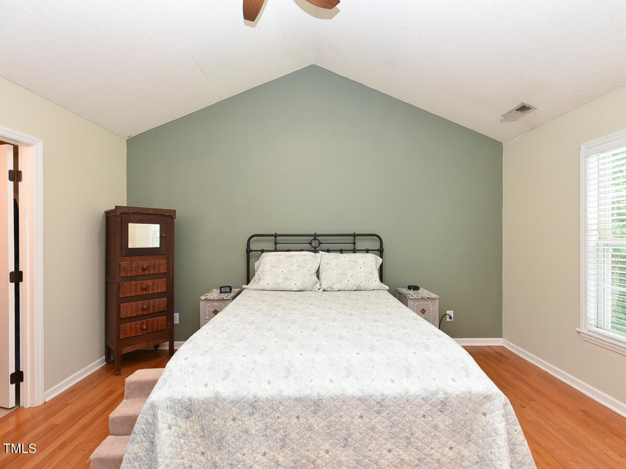 125 Walker Run Selma, NC 27576 - Photo 21 of 47 a bedroom with a bed and a window