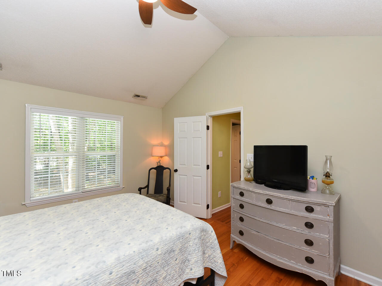 125 Walker Run Selma, NC 27576 - Photo 22 of 47 a bedroom with furniture and flat screen tv
