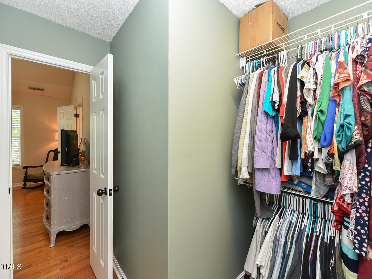 125 Walker Run Selma, NC 27576 - Photo 25 of 47 a view of walk in closet with clothes and shoes
