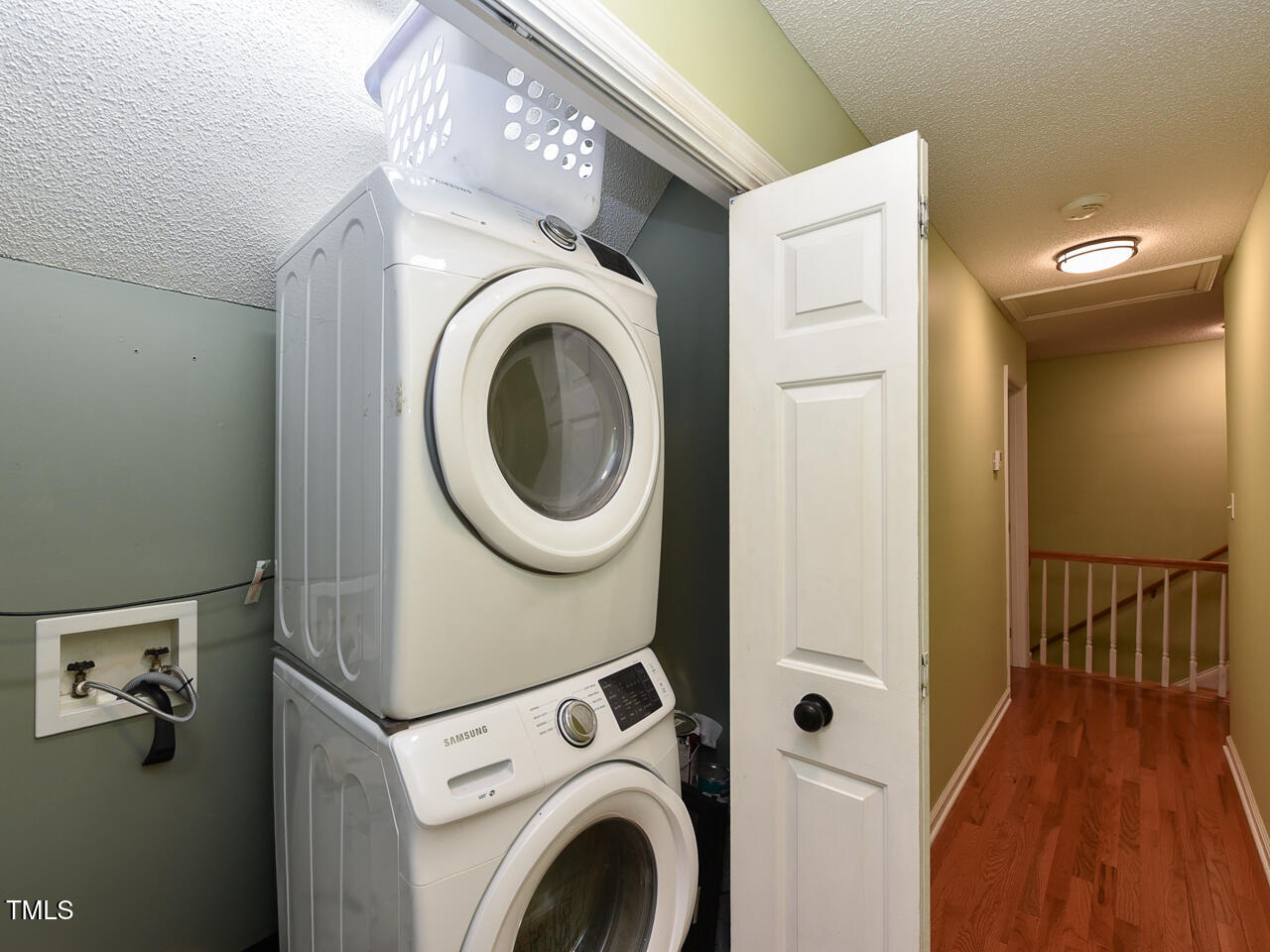 125 Walker Run Selma, NC 27576 - Photo 26 of 47 a view of a hallway with washer and dryer