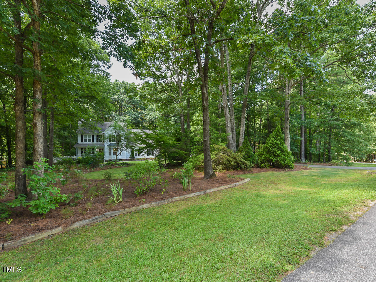 125 Walker Run Selma, NC 27576 - Photo 3 of 47 a view of a park with large trees