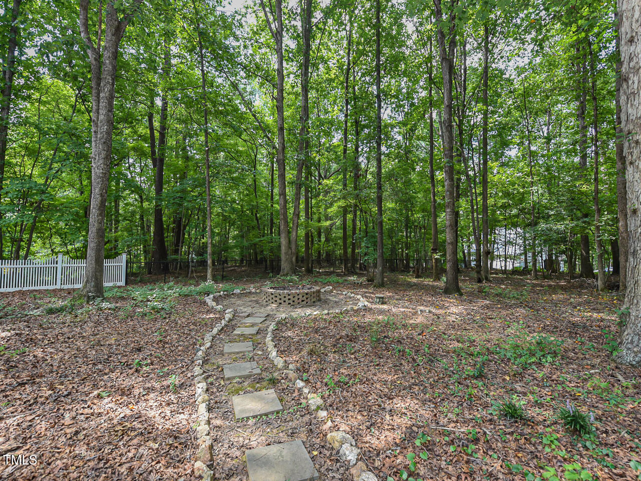 125 Walker Run Selma, NC 27576 - Photo 40 of 47 a view of a yard with large trees