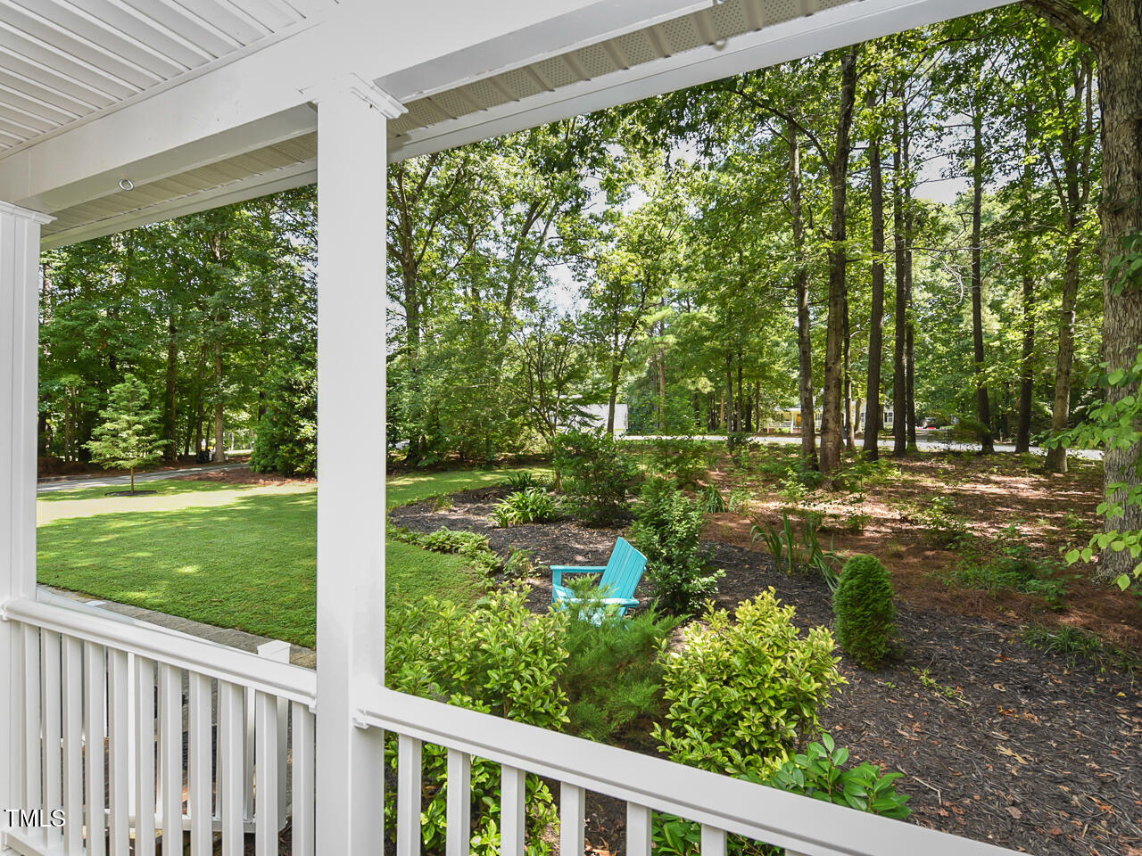 125 Walker Run Selma, NC 27576 - Photo 10 of 47 a view of a garden with a tree