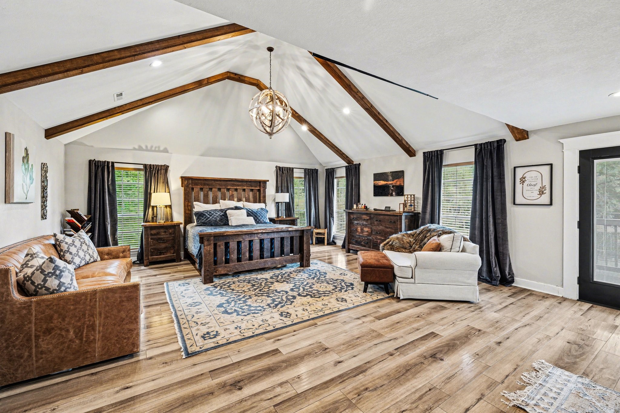 17519 Hawkin Lane Tomball, TX 77377 - Photo 26 of 48 Impeccable primary retreat offers vaulted ceilings with exposed beams, a private balcony, dual walk-in closets, and a private en suite.