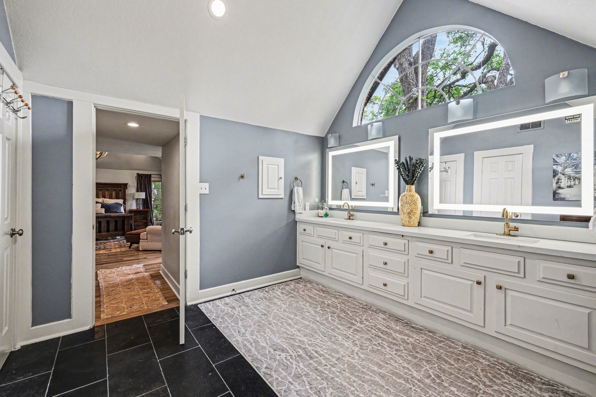 17519 Hawkin Lane Tomball, TX 77377 - Photo 29 of 48 Lavish primary bathroom presents dual sinks, an additional storage closet, and ample cabinet space.