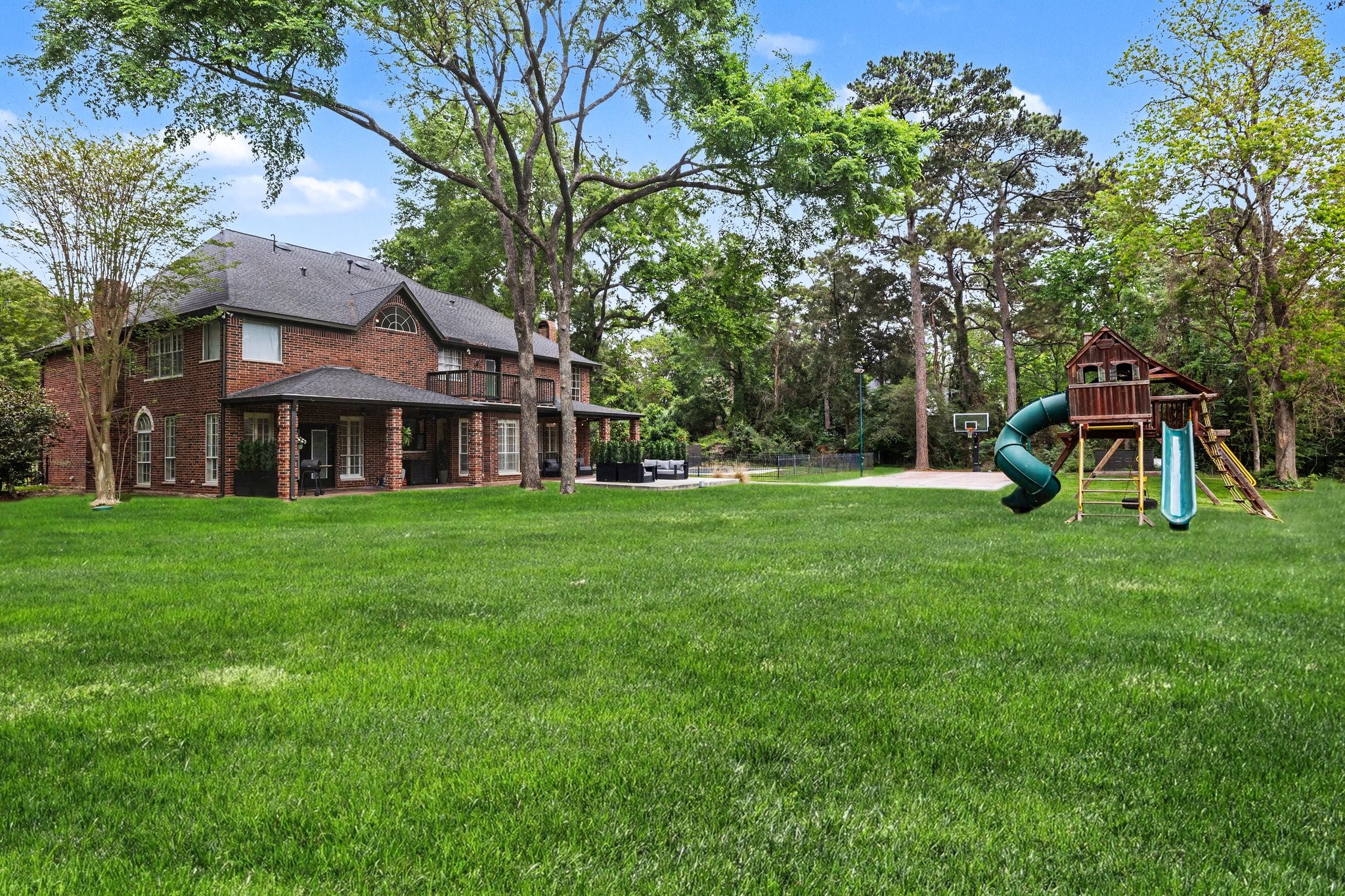 17519 Hawkin Lane Tomball, TX 77377 - Photo 43 of 48 Tons of green space and mature trees in this impeccable backyard.