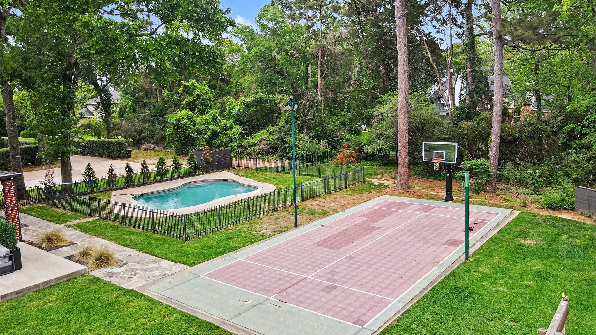 17519 Hawkin Lane Tomball, TX 77377 - Photo 44 of 48 Aerial view of the basketball court and pool.