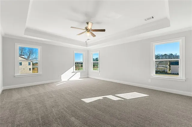 a view of empty room with windows