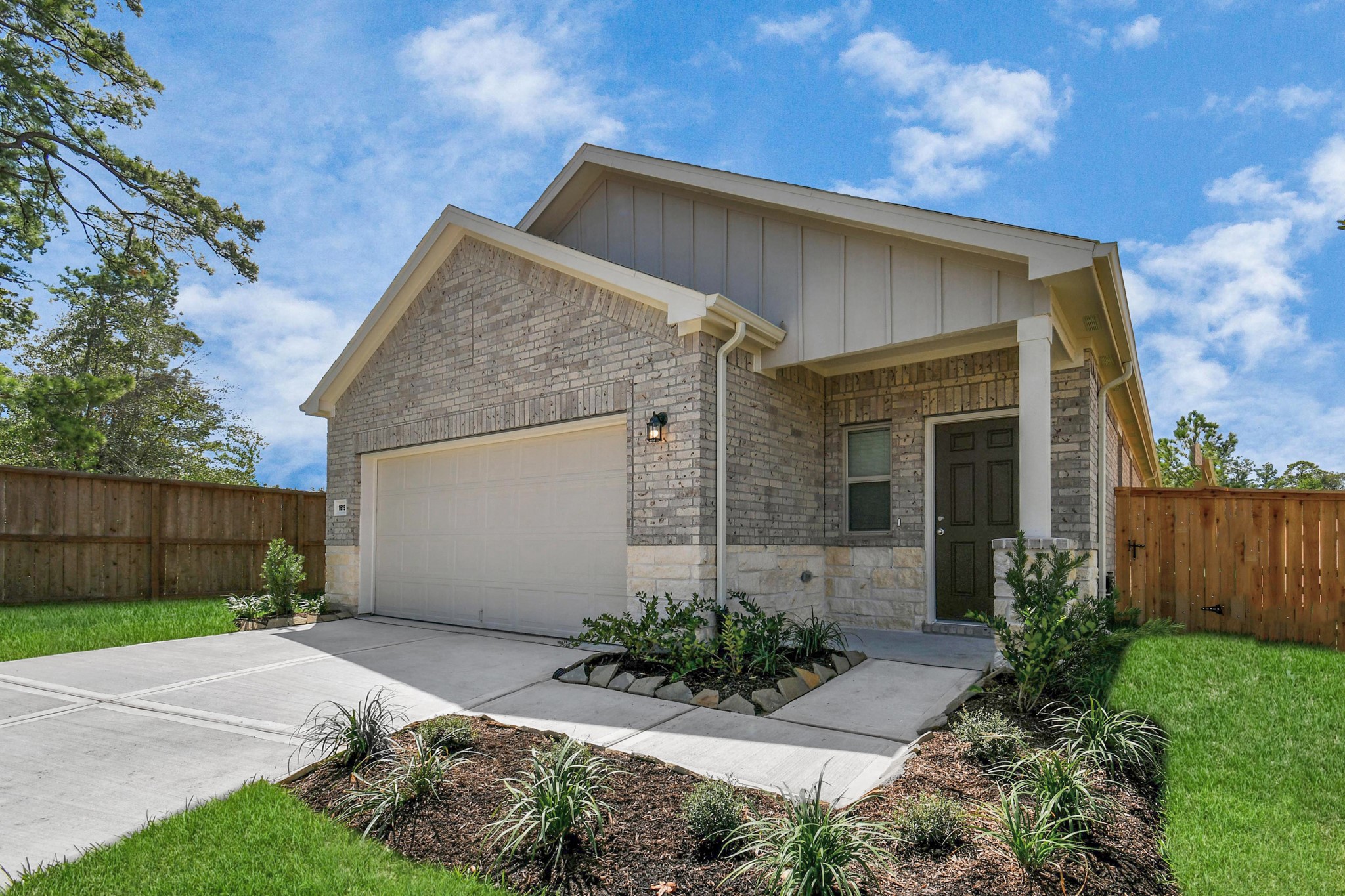 16150 Elbridge Court Conroe, TX 77302 - Photo 1 of 46 This one-story, four-bedroom home's front exterior captures the essence of a comfortable and inviting living space. It's a place that combines classic charm with modern convenience, offering a warm and welcoming environment for its fortunate occupants.