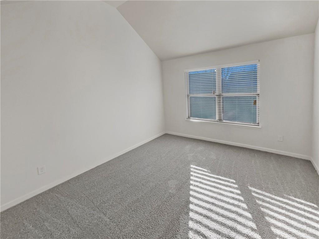 957 Parkside Pl Avenue McDonough, GA 30253 - Photo 22 of 27 an empty room with a window