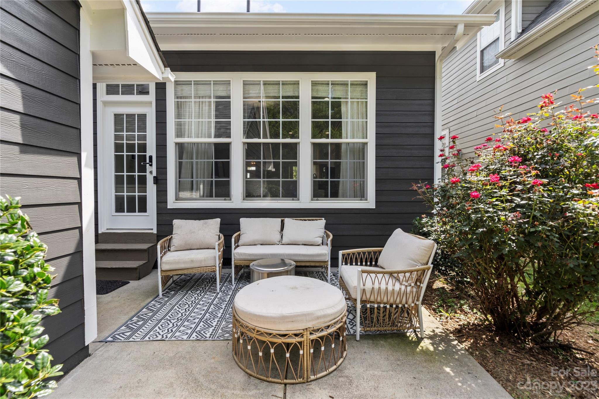 8315 Camberly Road Huntersville, NC 28078 - Photo 25 of 31 a view of a chair and tables in the patio