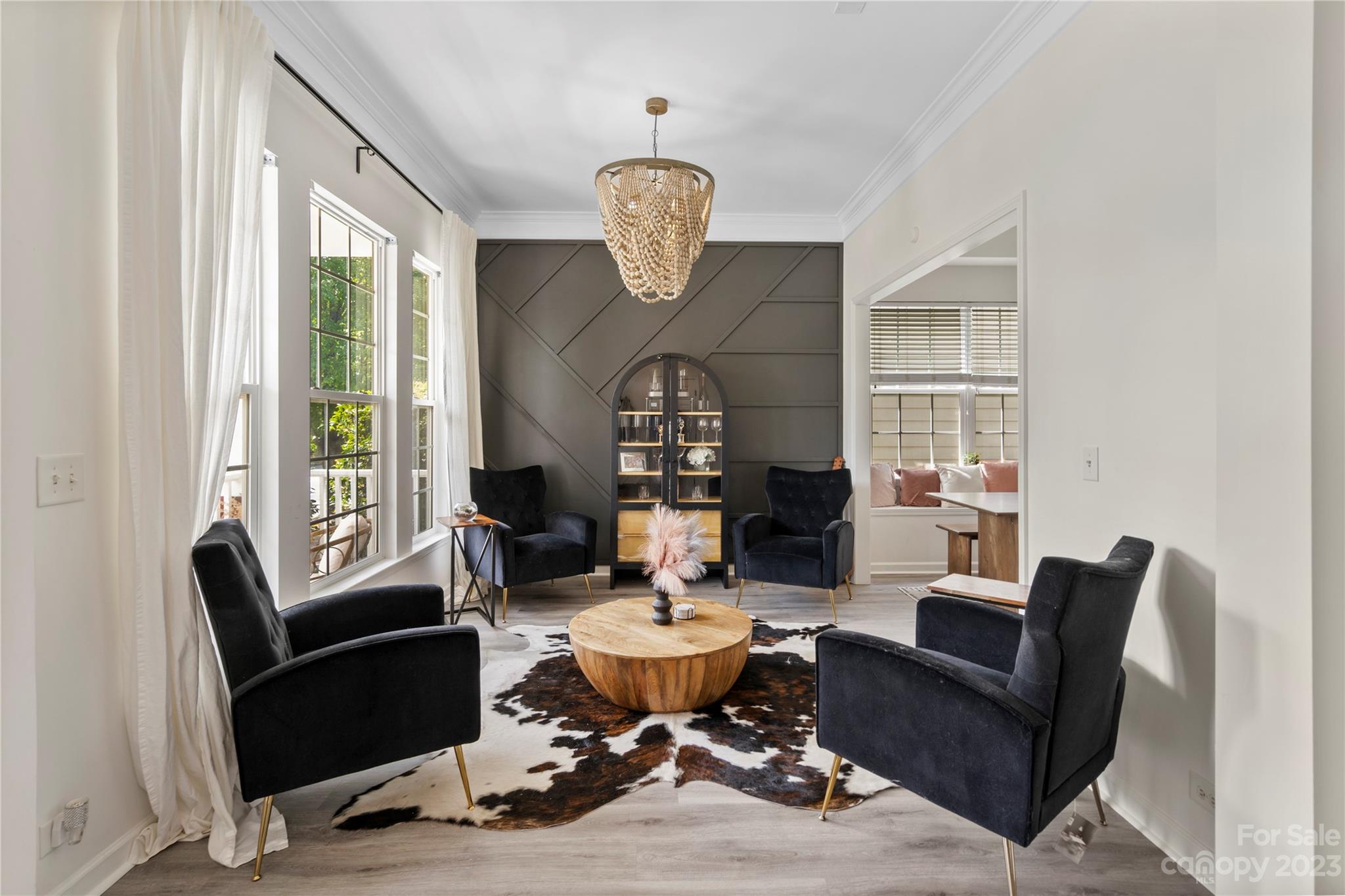 8315 Camberly Road Huntersville, NC 28078 - Photo 3 of 31 a living room with furniture a window and a table
