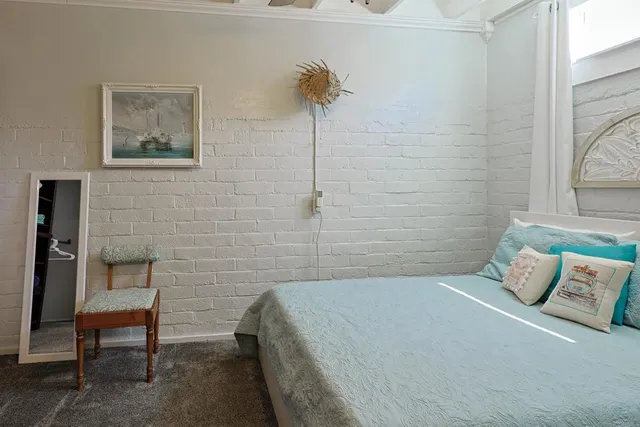 a bathroom with a bathtub and a table