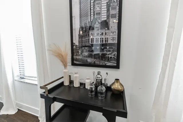 a view of a workspace with furniture