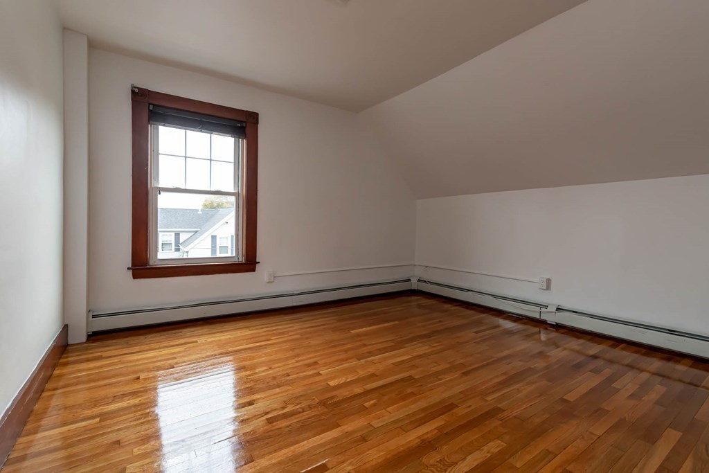 1 May Court Methuen, MA 01844 - Photo 18 of 40 a view of a room with wooden floor and window