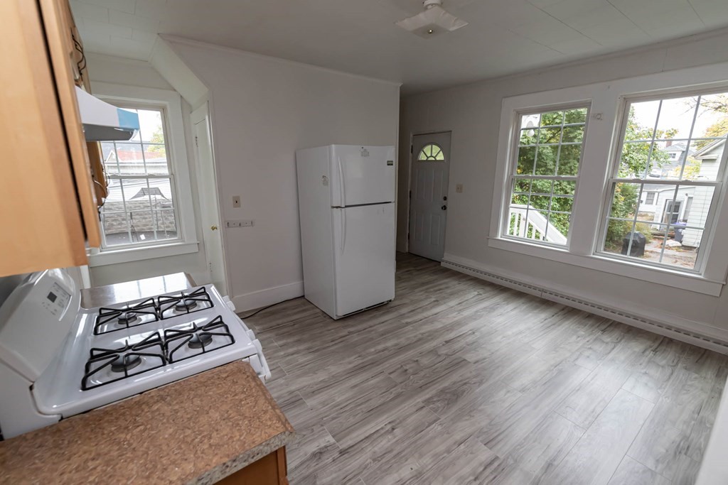1 May Court Methuen, MA 01844 - Photo 26 of 40 a view of kitchen with sink and wooden floor