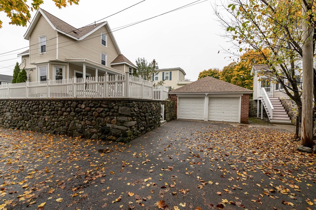 1 May Court Methuen, MA 01844 - Photo 4 of 40 a front view of a house with a garden