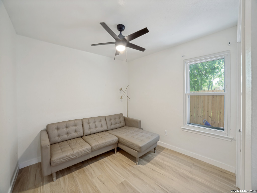 3439 Ridge Ranch San Antonio, TX 78247 - Photo 16 of 25 a living room with a couch and a window
