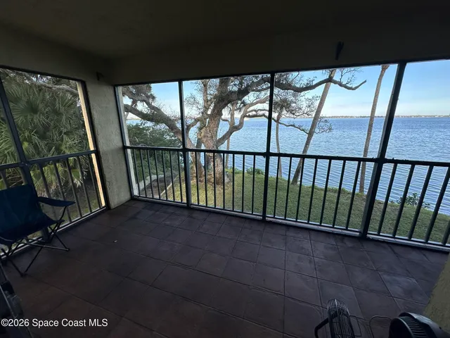 a sign that is on a brick wall