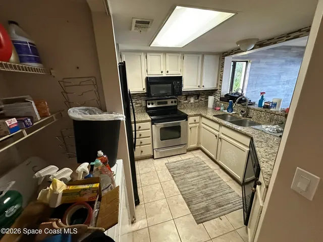 a view of swimming pool with outdoor seating