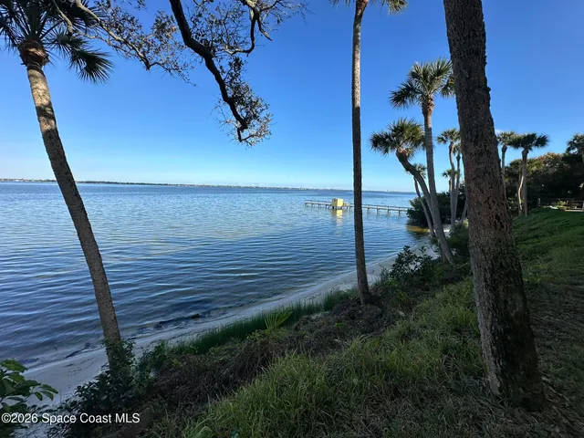 a view of stairs and wooden floor