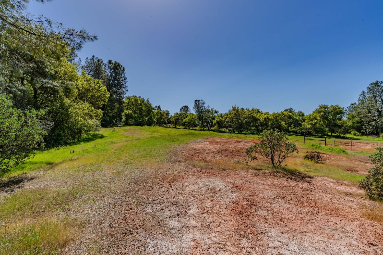5650 Red Valley Road Ione, CA 95640 - Photo 55 of 64 a view of a lake with houses in the back
