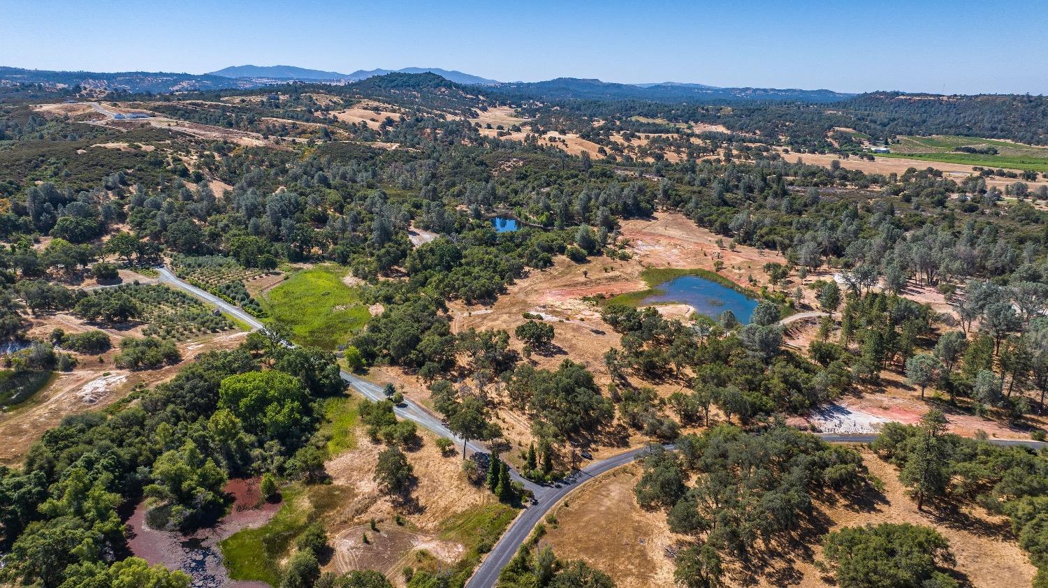 5650 Red Valley Road Ione, CA 95640 - Photo 64 of 64 a view of a city with mountains in the background