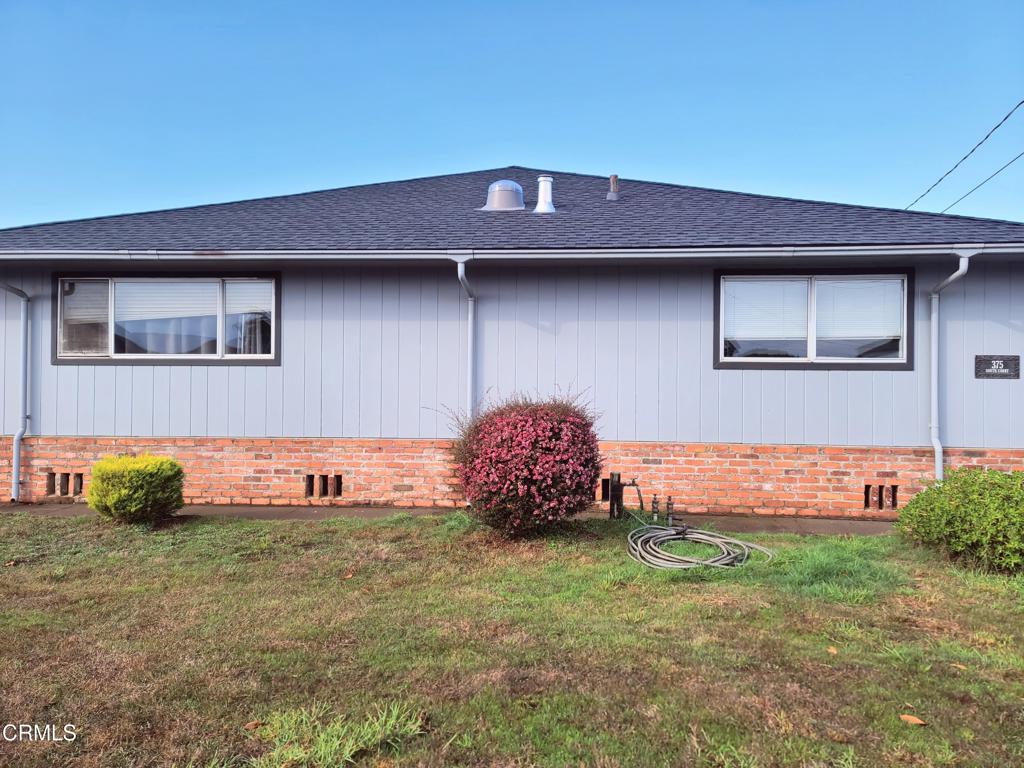 375 South Corry Street Fort Bragg, CA 95437 - Photo 33 of 34 a front view of a house with garden