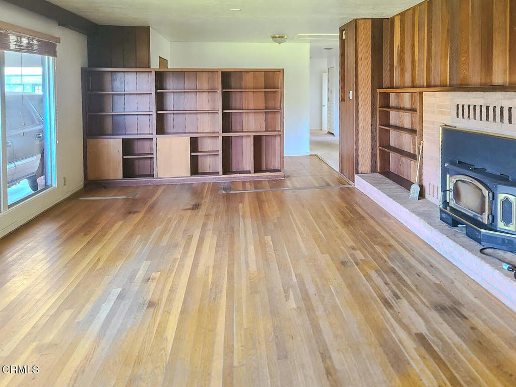 375 South Corry Street Fort Bragg, CA 95437 - Photo 6 of 34 a view of wooden floor and windows in a room