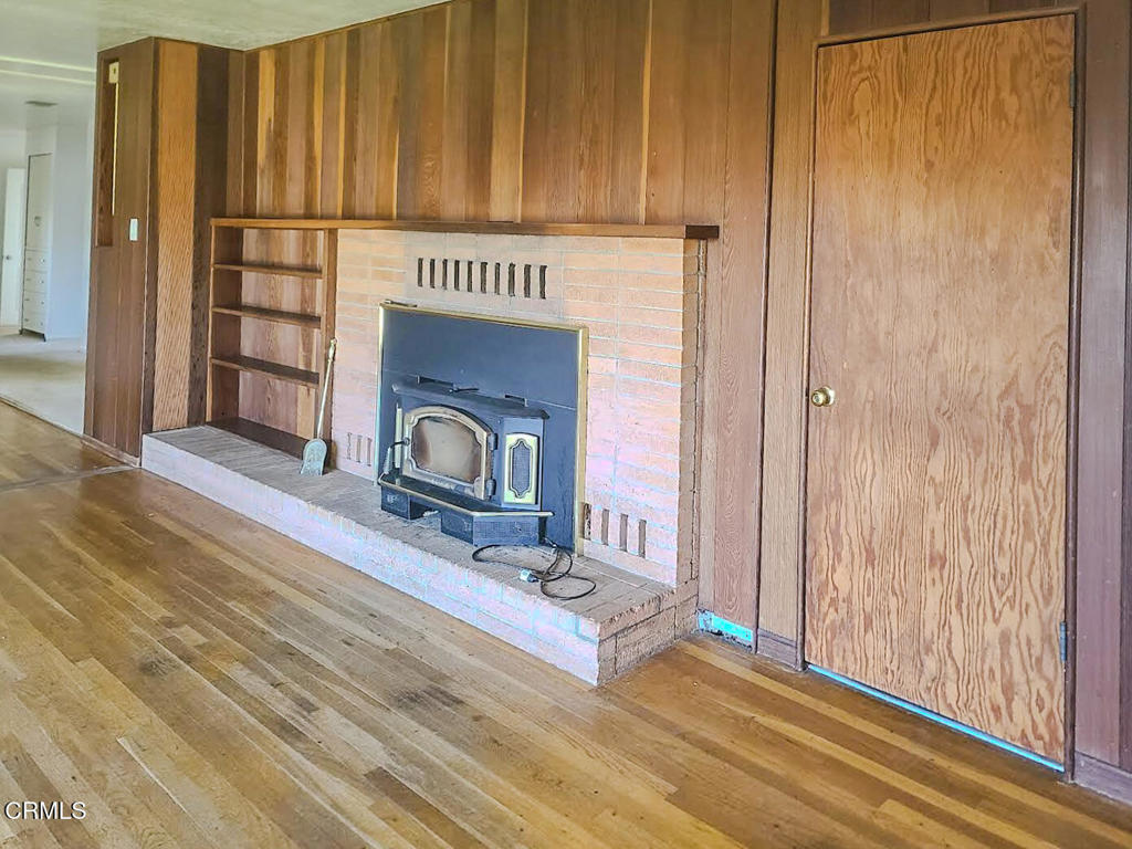 375 South Corry Street Fort Bragg, CA 95437 - Photo 7 of 34 a front view of a house with wooden floor