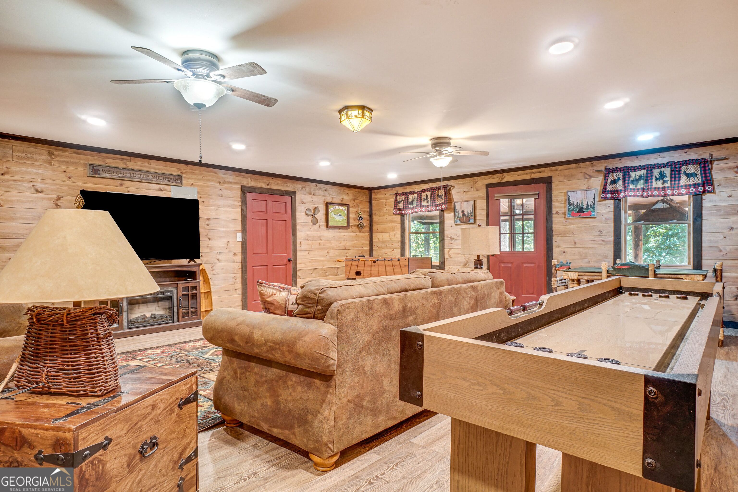 2183 Chimney Mountain Road Sautee Nacoochee, GA 30571 - Photo 13 of 28 a living room with furniture and a flat screen tv